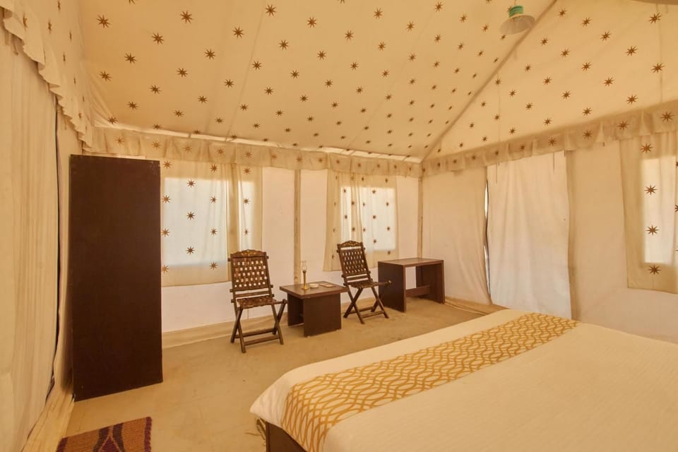 Premium Tent, 1 King Bed, Balcony, Resort View | 1 bedroom, rollaway beds, bed sheets