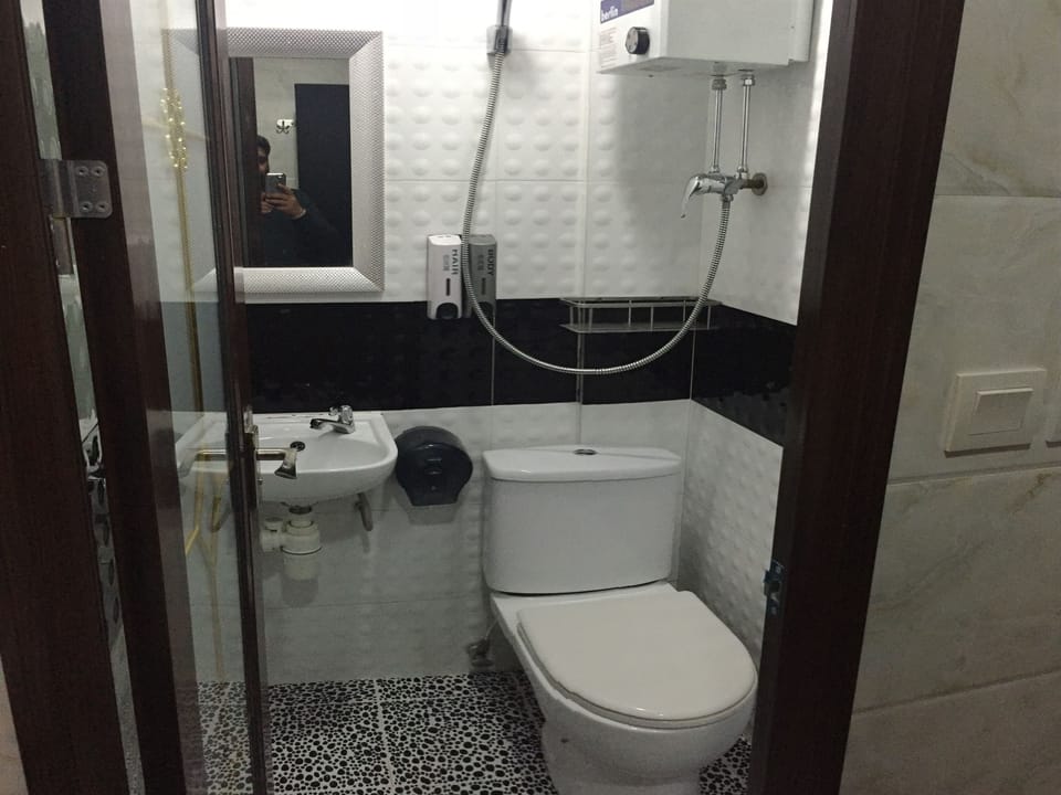 Shower, free toiletries, hair dryer, slippers