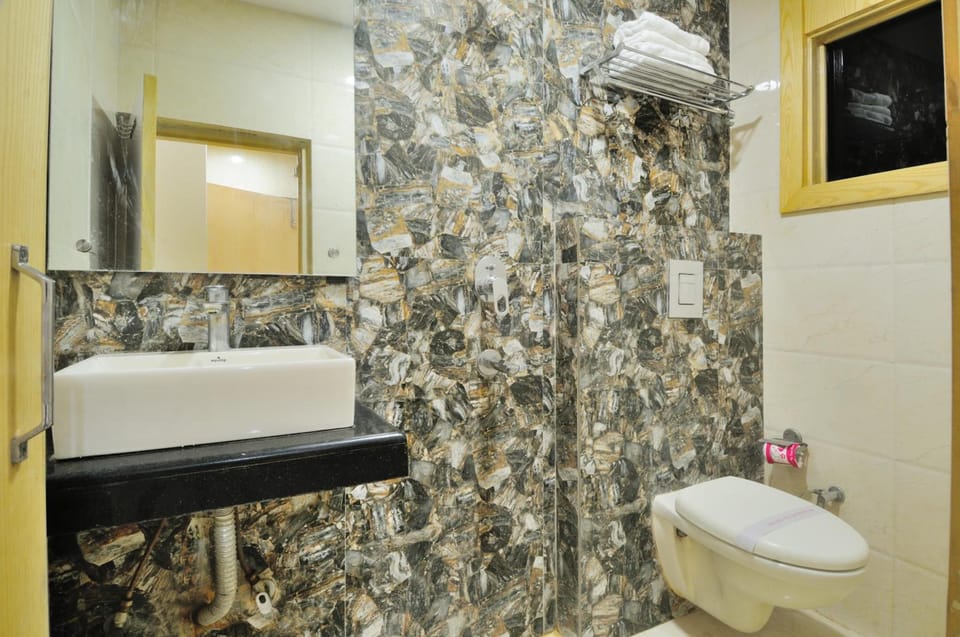 Shower, free toiletries, towels, soap