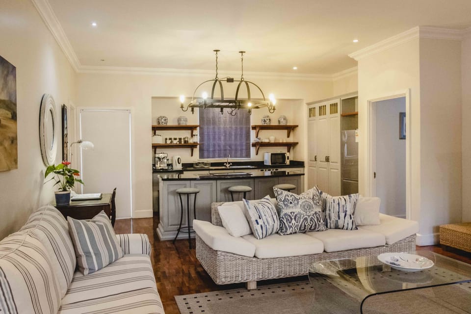 Deluxe Cottage, 1 Bedroom | Living area | 55-inch LED TV with satellite channels