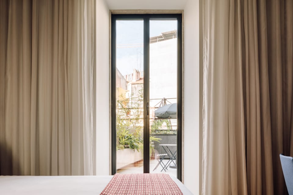 Terrace | Hypo-allergenic bedding, free minibar items, in-room safe
