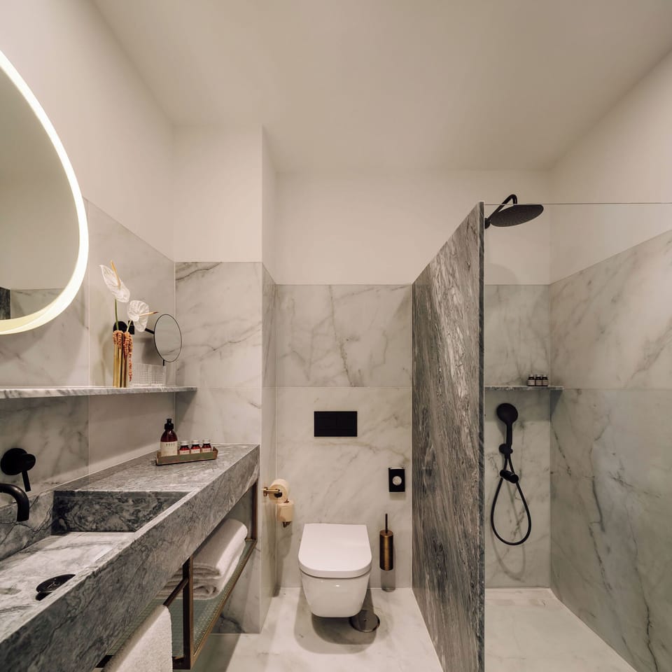 Shower, free toiletries, hair dryer, bathrobes