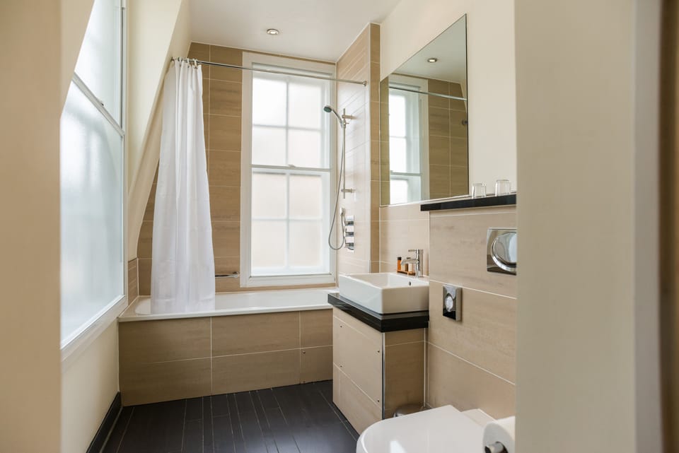 Eco-friendly toiletries, hair dryer, towels, soap