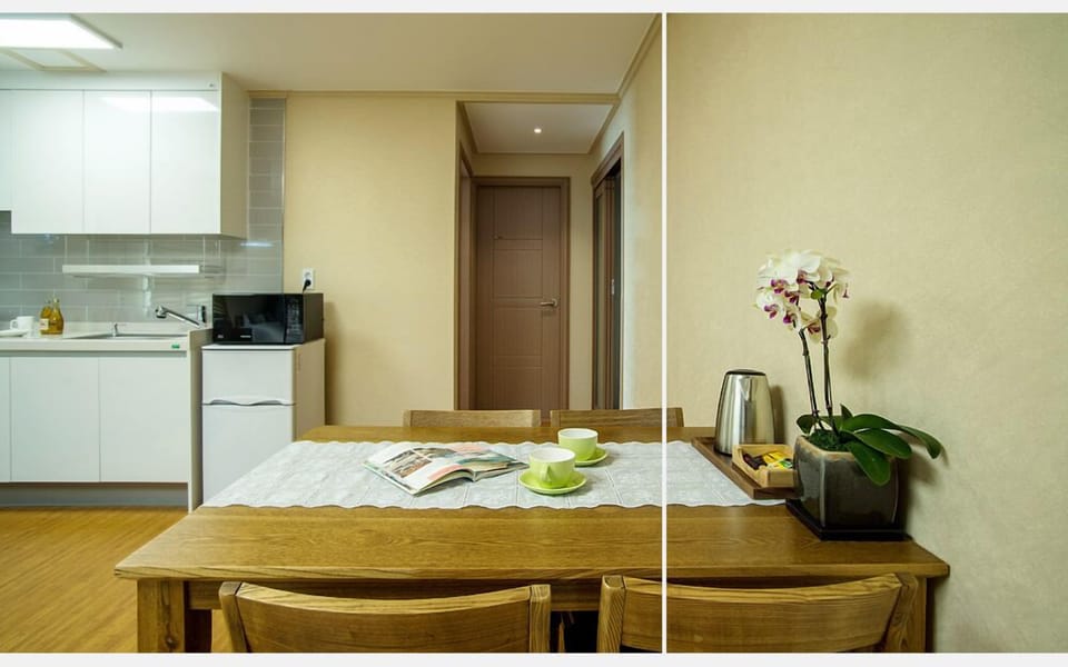Basic Suite, 1 Bedroom, Kitchenette, Partial Sea View | Living area | 40-inch flat-screen TV with cable channels, TV, pay movies