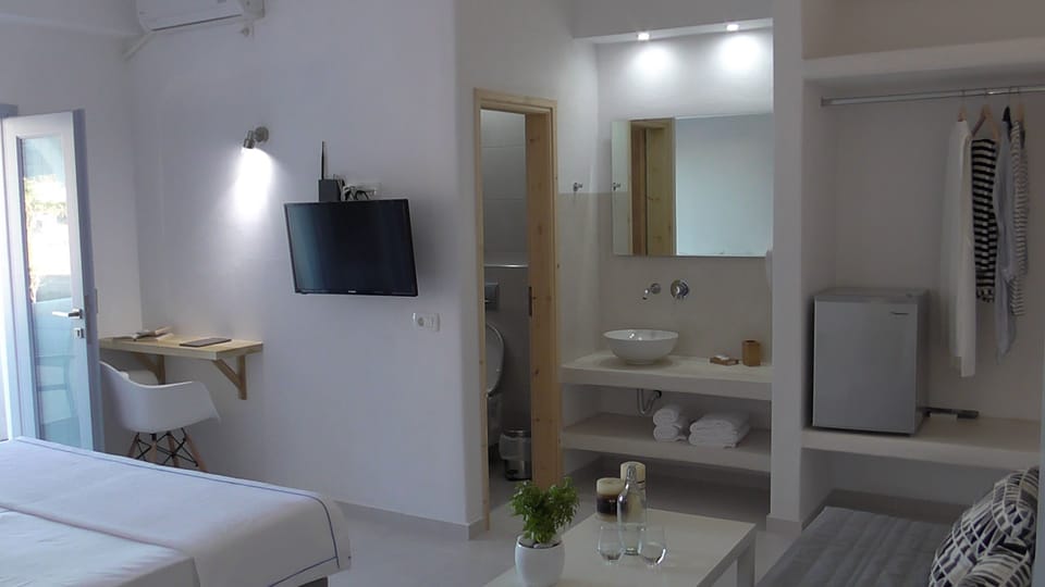 Double or Twin Room, Garden View | Living area | LED TV