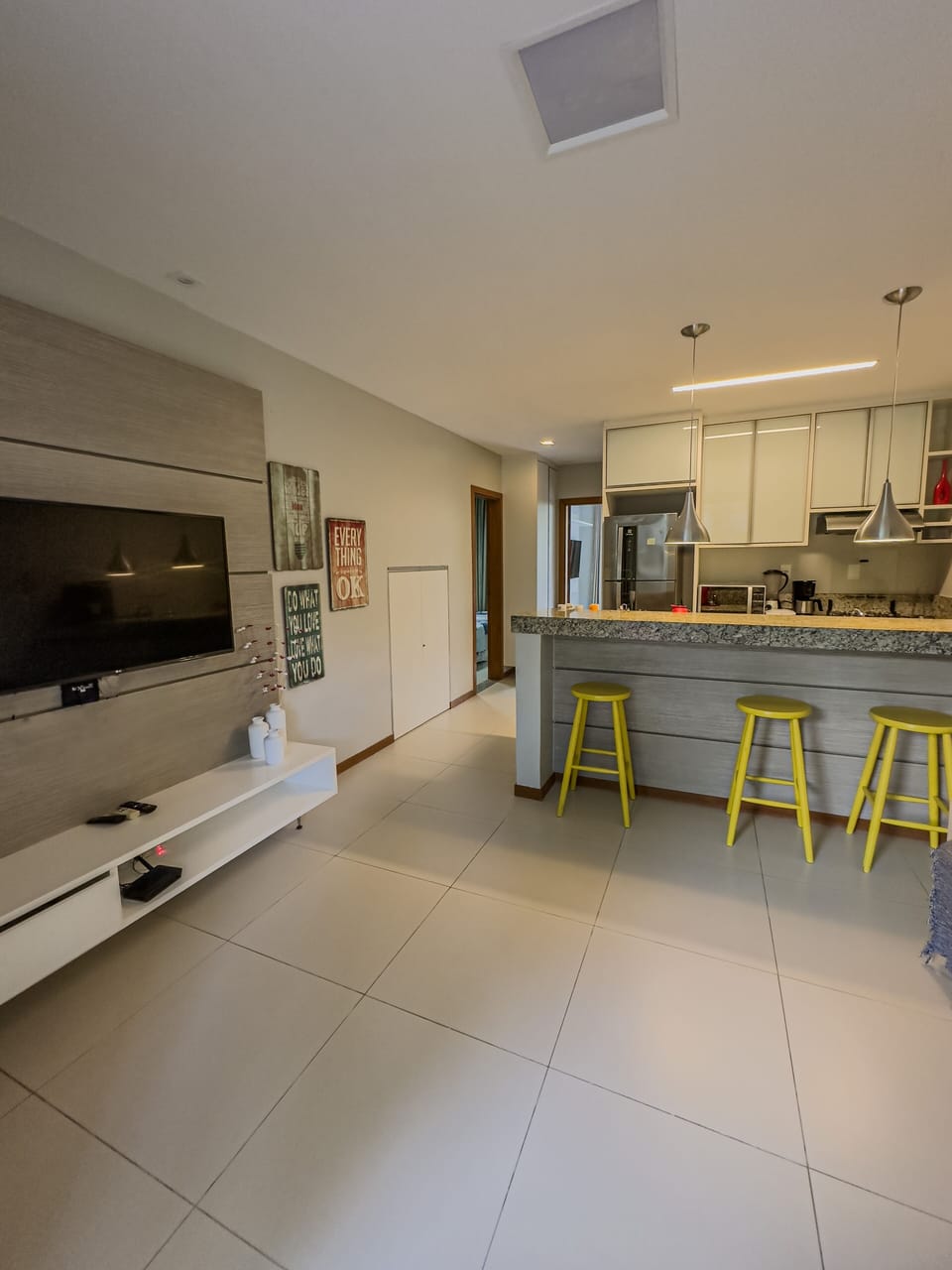 Deluxe Apartment | Living area | 50-inch LED TV with satellite channels, TV