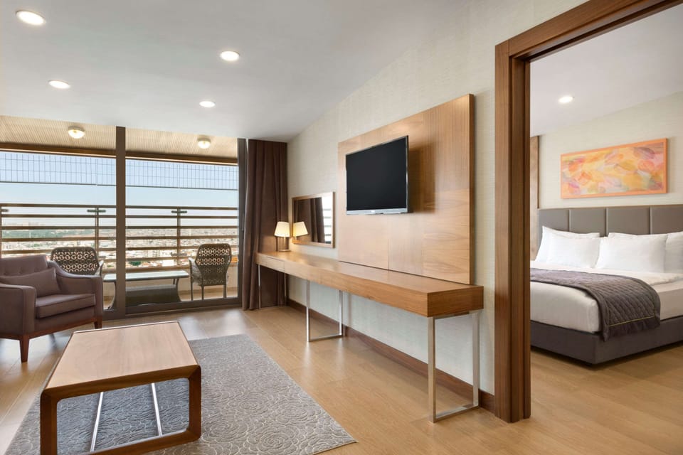 Suite, 1 Double Bed | Minibar (free items), in-room safe, desk, soundproofing