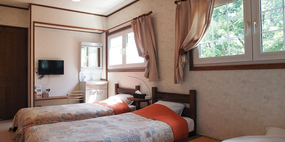 Family Room (with Japanese Futons) | Blackout drapes, free WiFi, bed sheets
