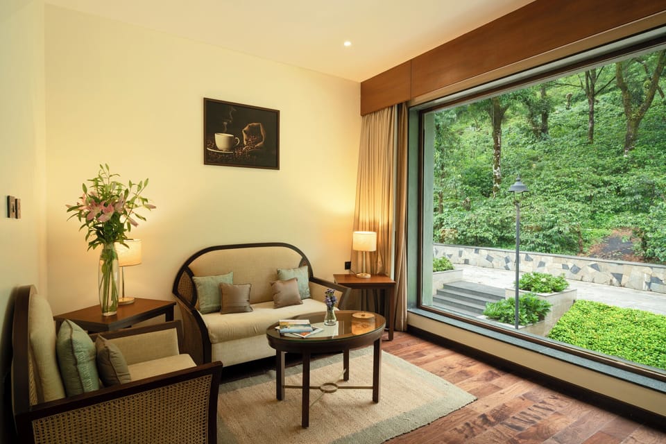 Garden Suites | Living area | 40-inch flat-screen TV with cable channels, TV, foosball