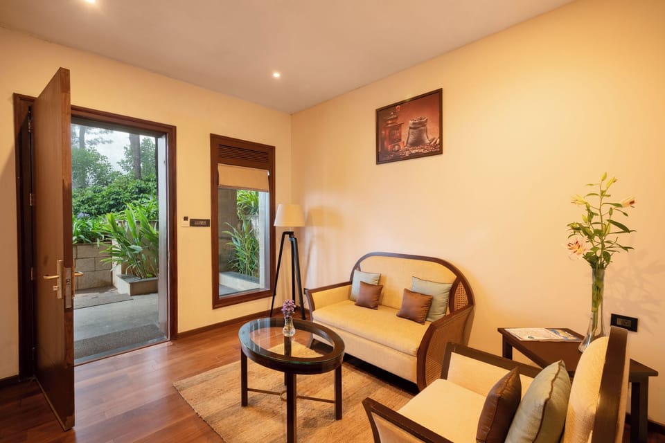Coffee Suites | Living area | 40-inch flat-screen TV with cable channels, TV, foosball