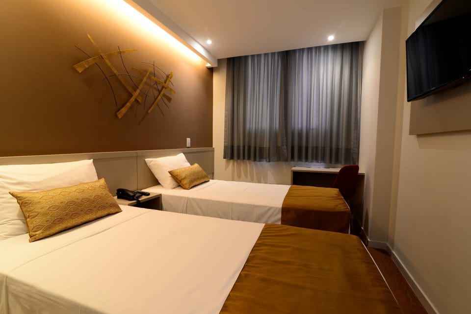Standard Single Room, 2 Twin Beds | Minibar, in-room safe, desk, blackout drapes