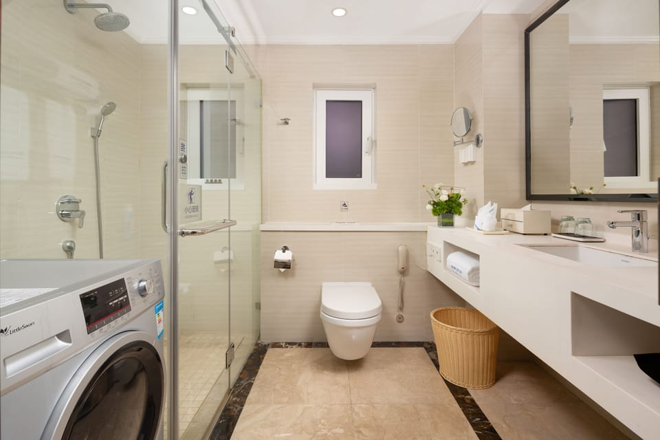 Shower, free toiletries, hair dryer, bathrobes