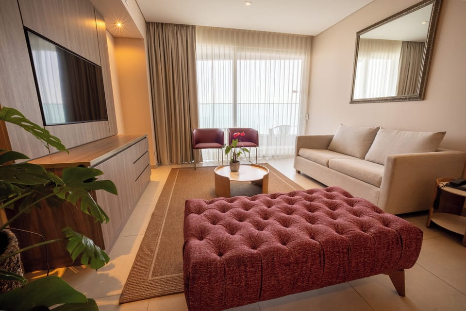 Junior Double Room, 1 King Bed with Sofa bed (Junior Suite King Bed) | Living area | 32-inch flat-screen TV with cable channels, TV