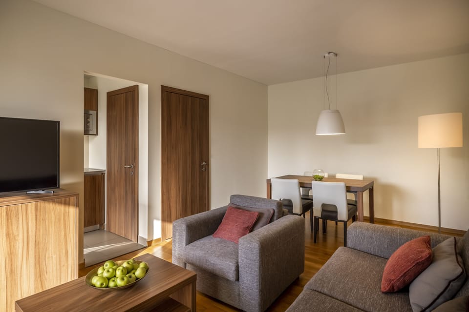 Premium Apartment, 1 Bedroom | Living area | LCD TV