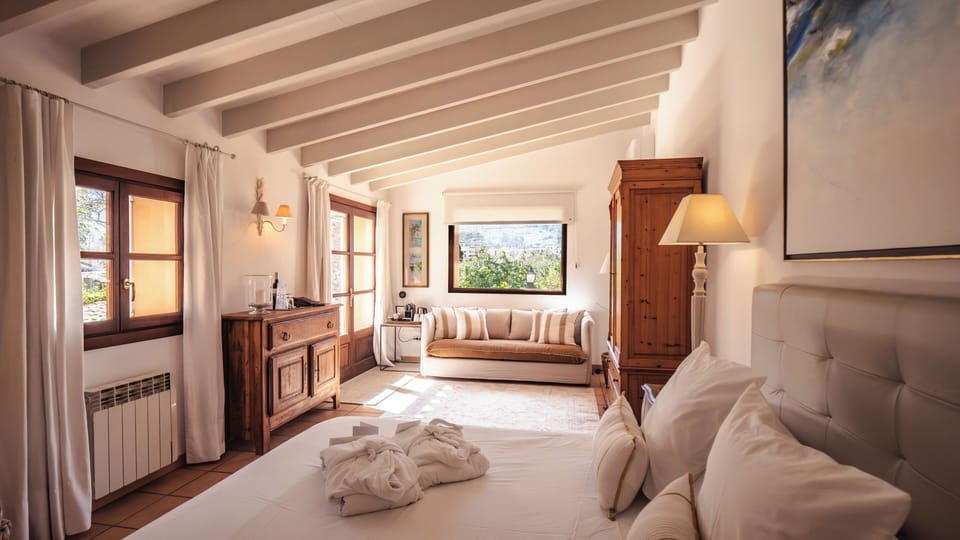 Junior Suite, Terrace | Minibar, in-room safe, desk, soundproofing