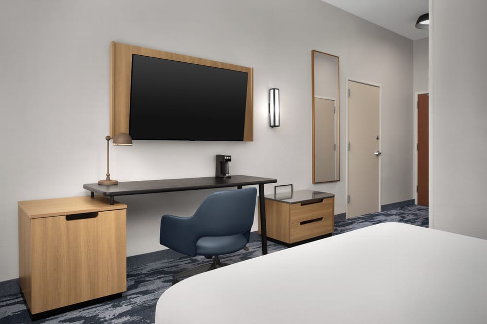 Premium bedding, desk, blackout drapes, iron/ironing board