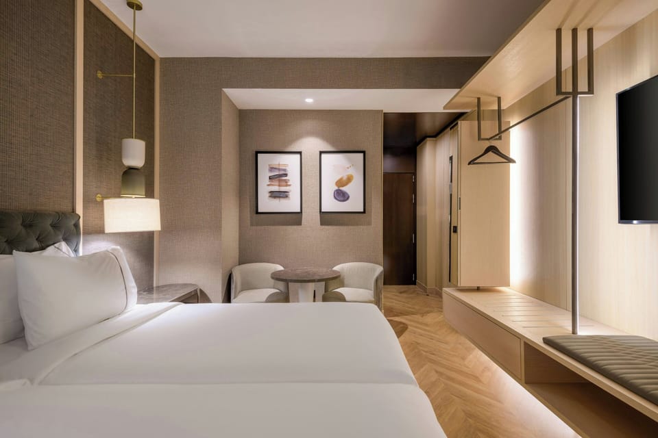 Hypo-allergenic bedding, pillowtop beds, minibar, in-room safe