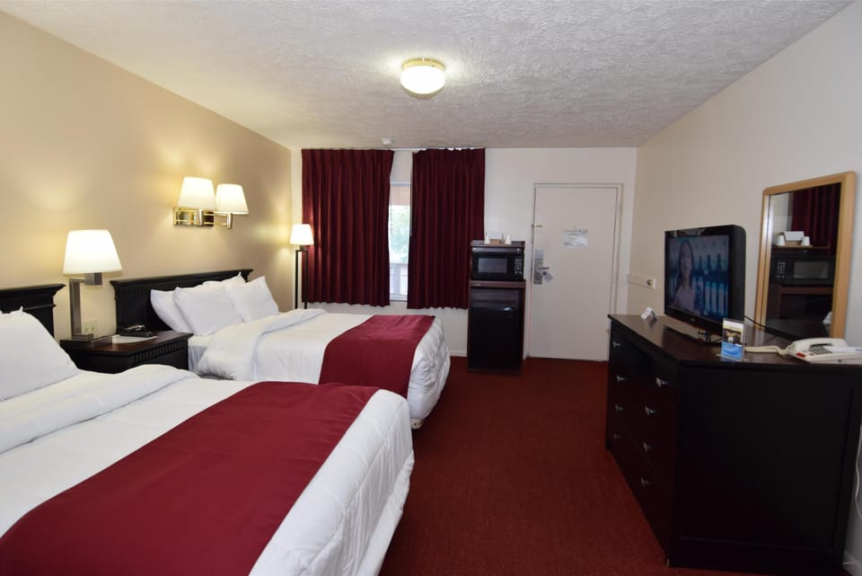 Pillowtop beds, individually furnished, desk, blackout drapes