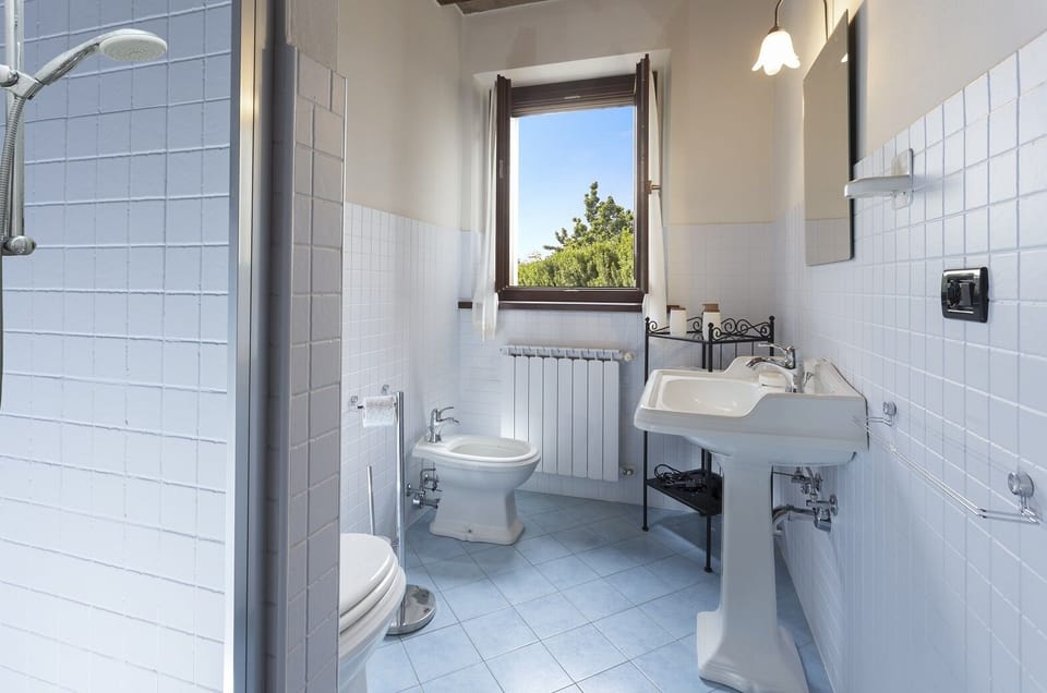 Apartment, 1 Bedroom, Garden Area | Bathroom | Shower, rainfall showerhead, free toiletries, hair dryer