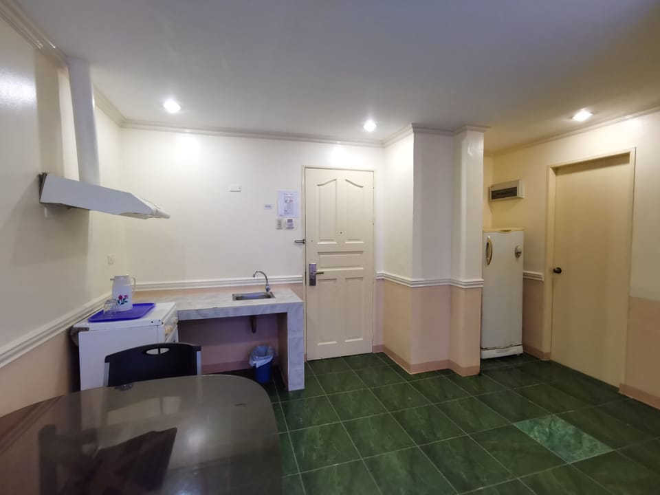 Family Quadruple Room | Private kitchen | Fridge