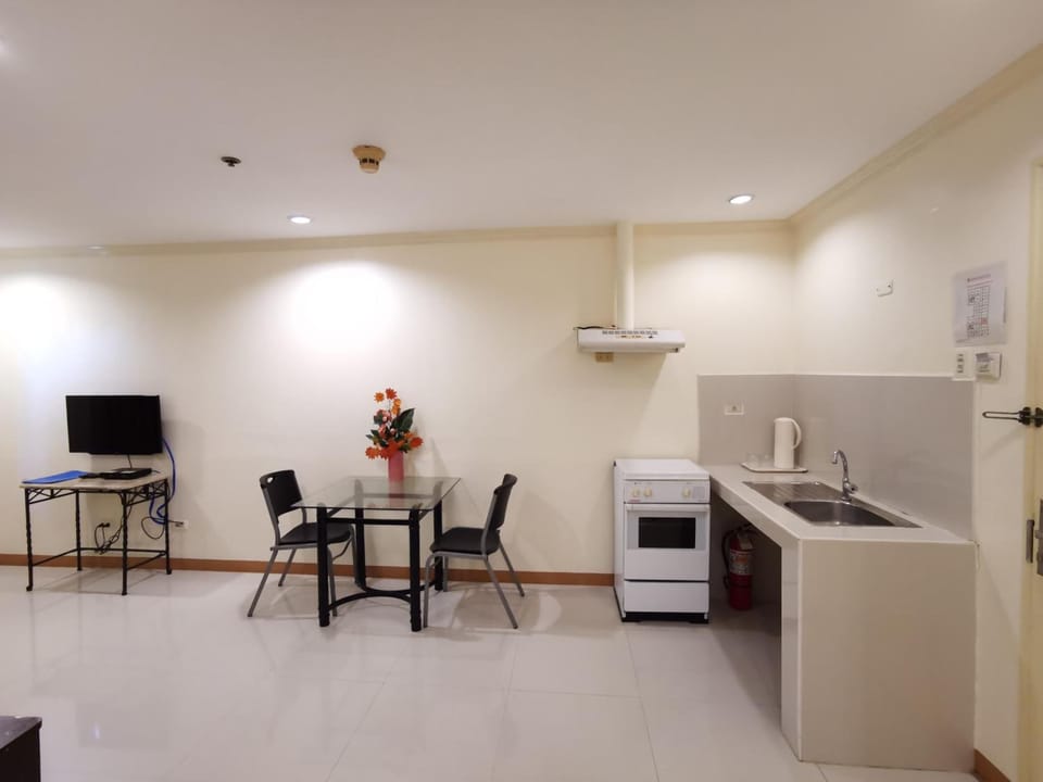 Family Quadruple Room | Private kitchen | Fridge