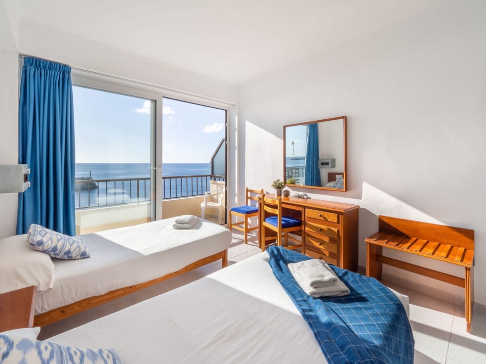 Desk, free WiFi, bed sheets