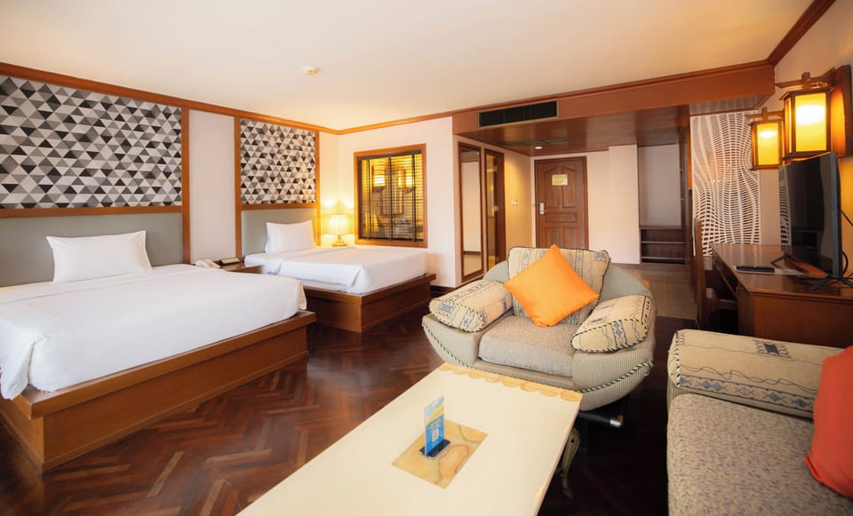 Executive Pool View Family Room with Balcony | Minibar, in-room safe, desk, blackout drapes