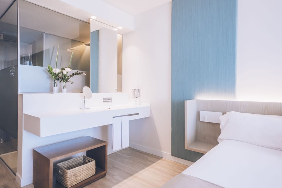 Eco-friendly toiletries, hair dryer, bathrobes, slippers