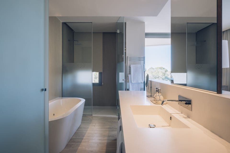 Eco-friendly toiletries, hair dryer, bathrobes, slippers