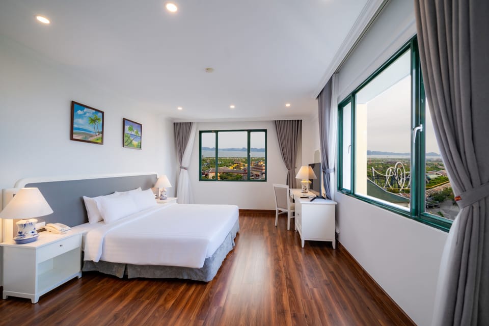 Deluxe Double or Twin Room | Minibar, in-room safe, desk, laptop workspace