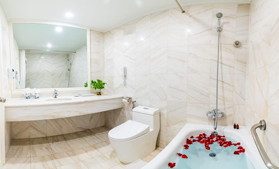 Separate tub and shower, deep soaking tub, designer toiletries