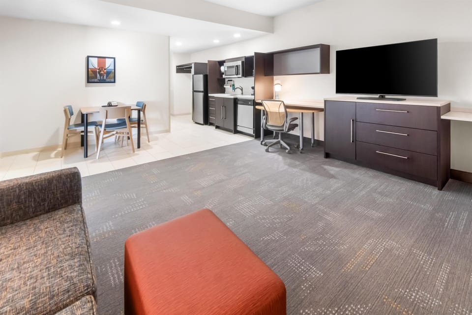 Suite, 1 Bedroom, Non Smoking | Desk, laptop workspace, blackout drapes, iron/ironing board
