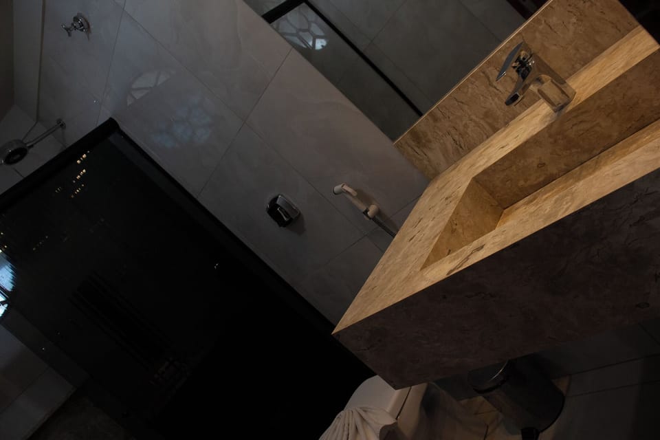 Family Apartment, Multiple Beds, City View | Bathroom | Shower, free toiletries, towels