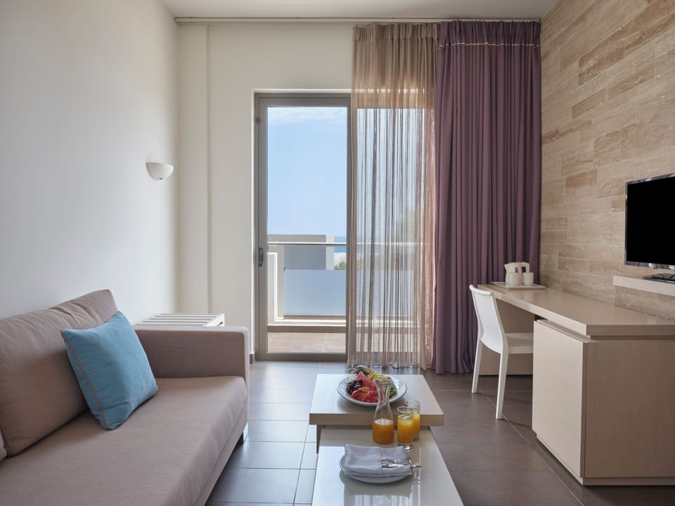 One Bedroom Suite Limited Sea View | Living area | TV