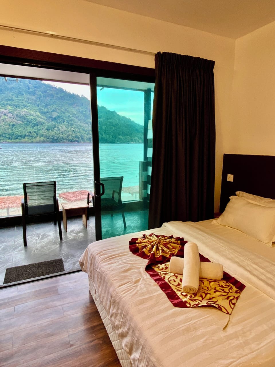 Seafront Family Room | In-room safe, desk, iron/ironing board, bed sheets