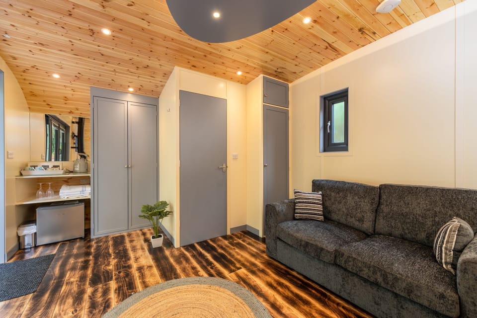 Cabin | Desk, iron/ironing board, bed sheets