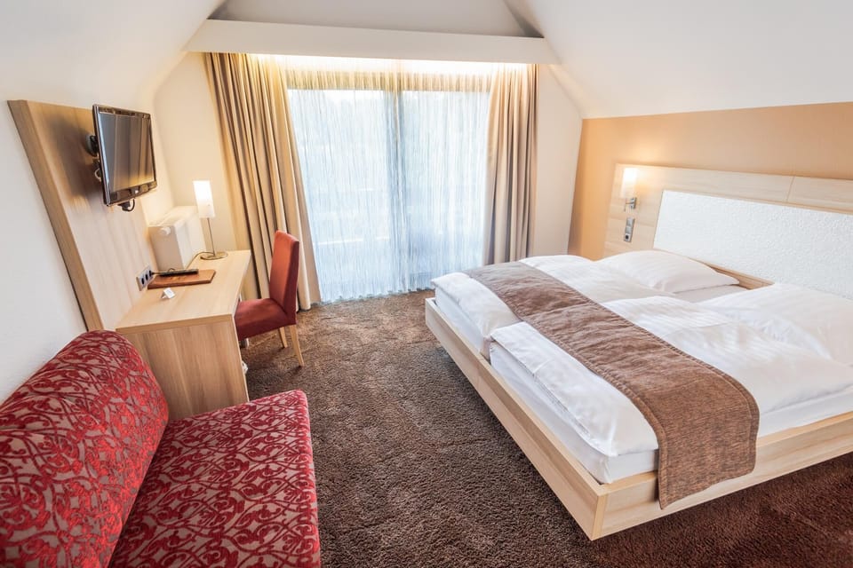 Double or Twin Room (Main Building or Annex Building) | In-room safe, desk, iron/ironing board, cribs/infant beds