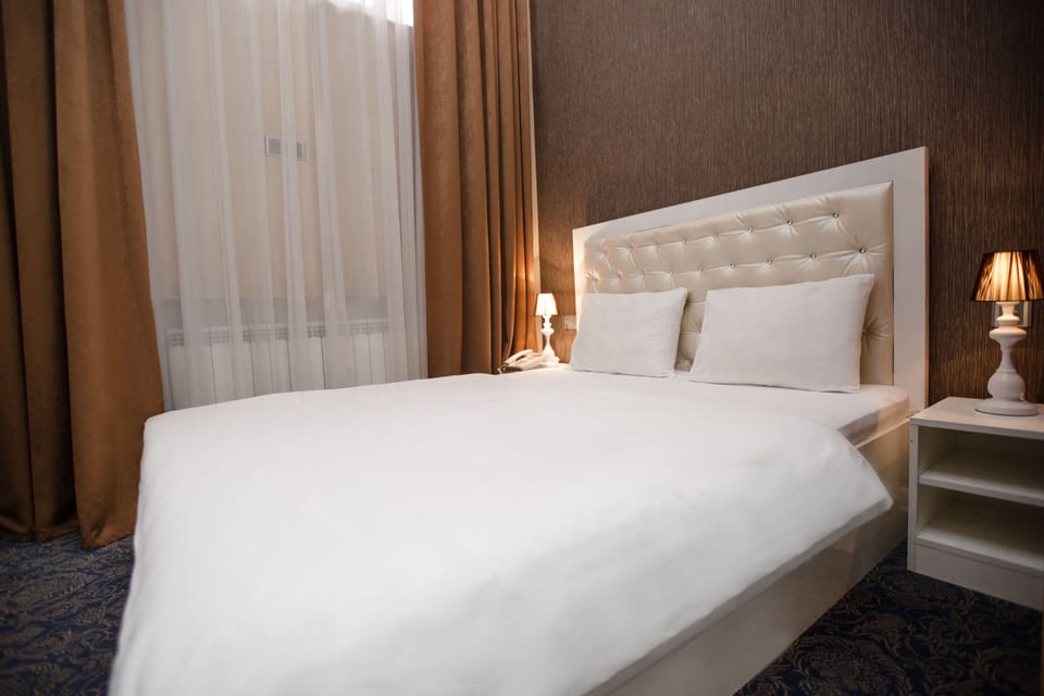 Economy Double Room, 1 Double Bed, Smoking | Premium bedding, minibar, in-room safe, desk