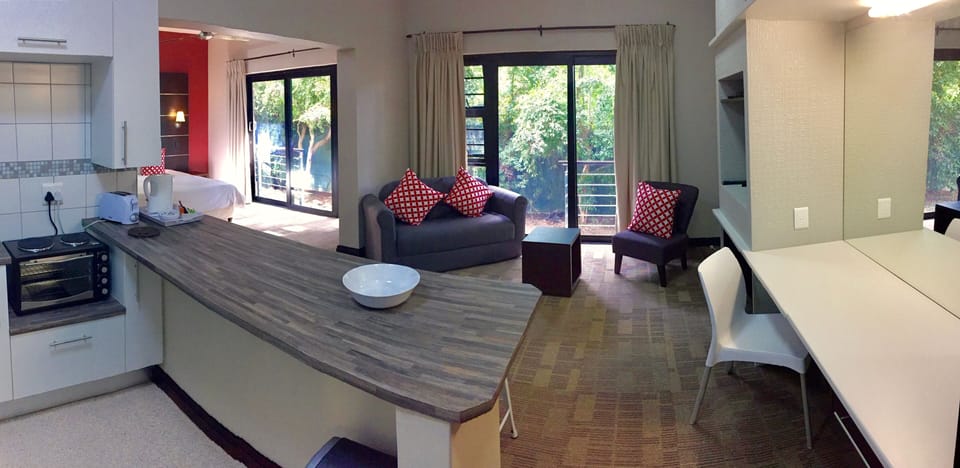 Junior Studio Suite, 1 Bedroom, Kitchen | Living area | 32-inch flat-screen TV with satellite channels, TV, DVD player