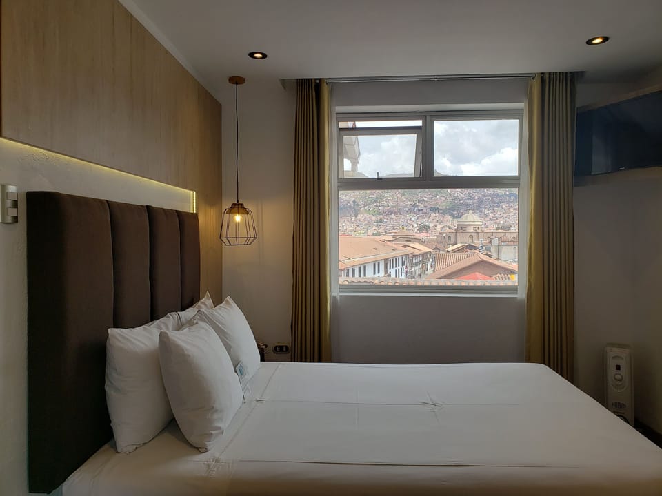 Deluxe Room, Refrigerator, City View | Premium bedding, in-room safe, desk, laptop workspace