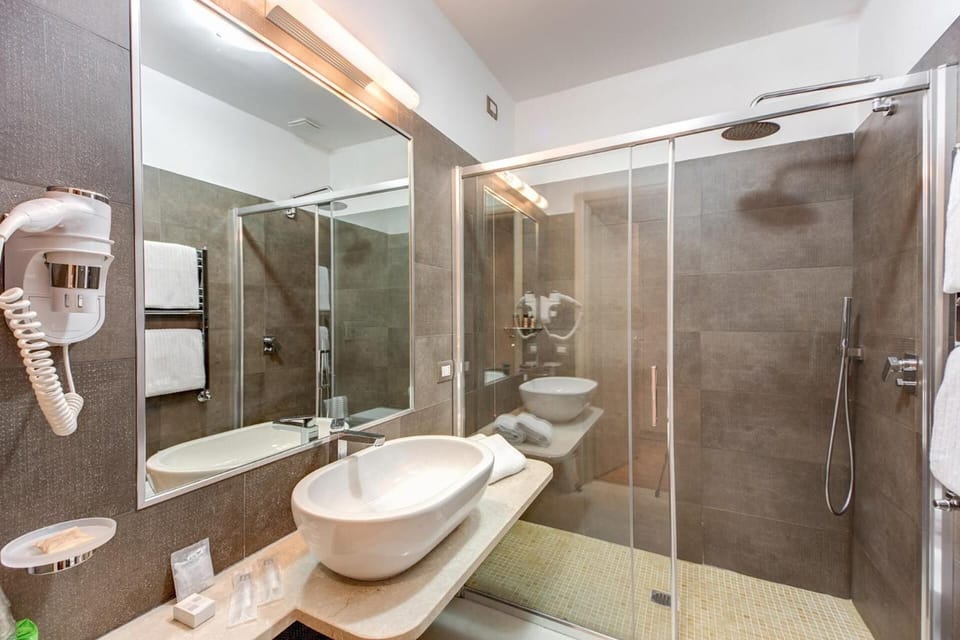 Shower, free toiletries, hair dryer, bidet
