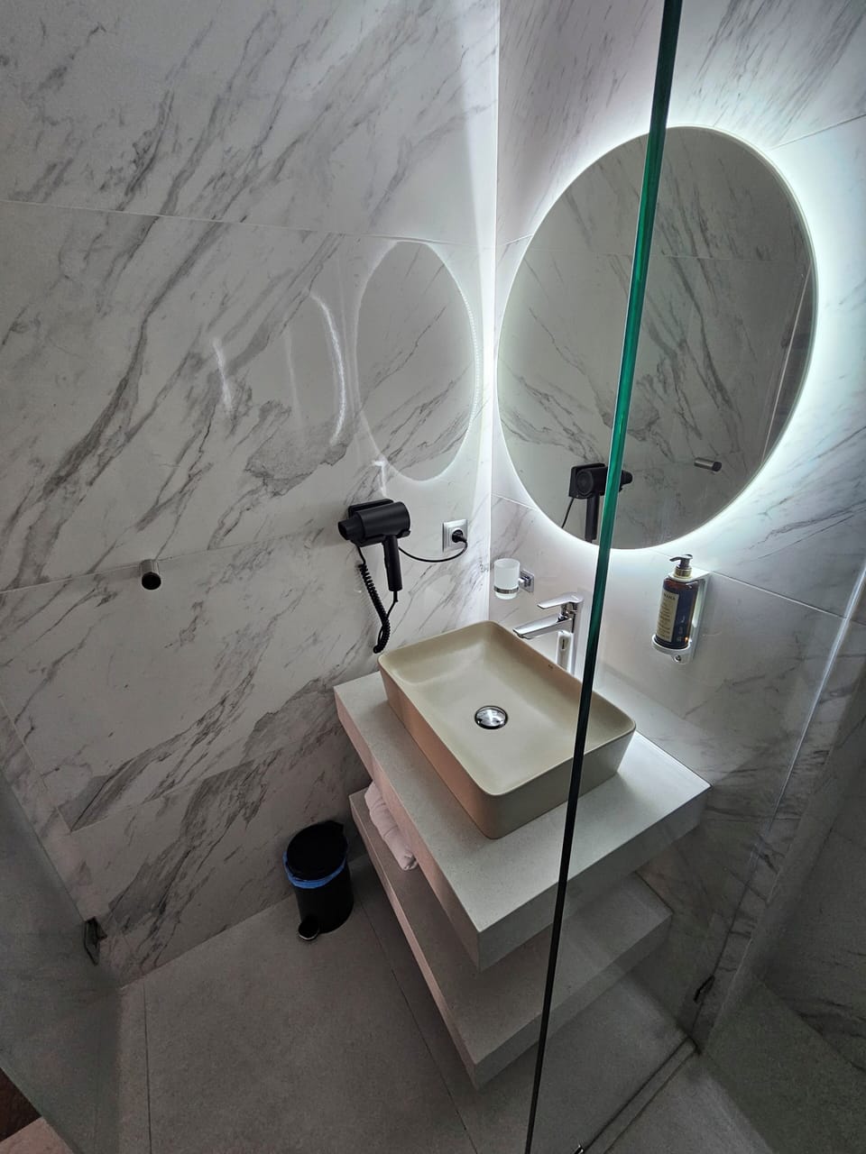 Shower, rainfall showerhead, designer toiletries, hair dryer