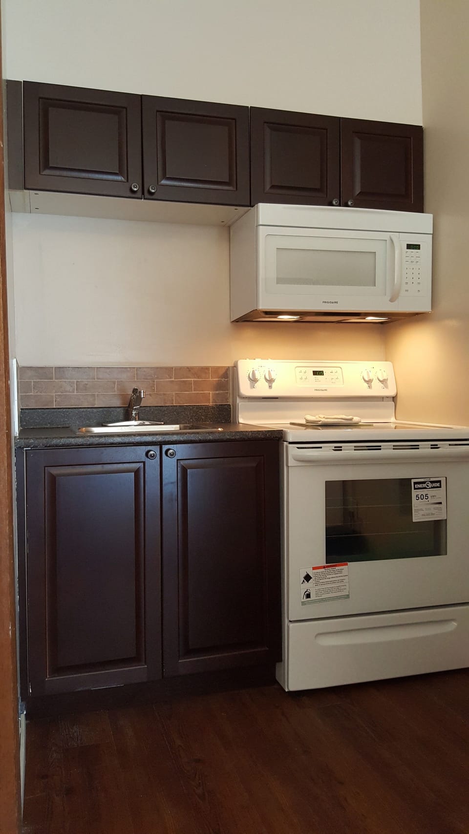 Economy Studio Suite, Kitchenette | Private kitchen | Fridge, microwave
