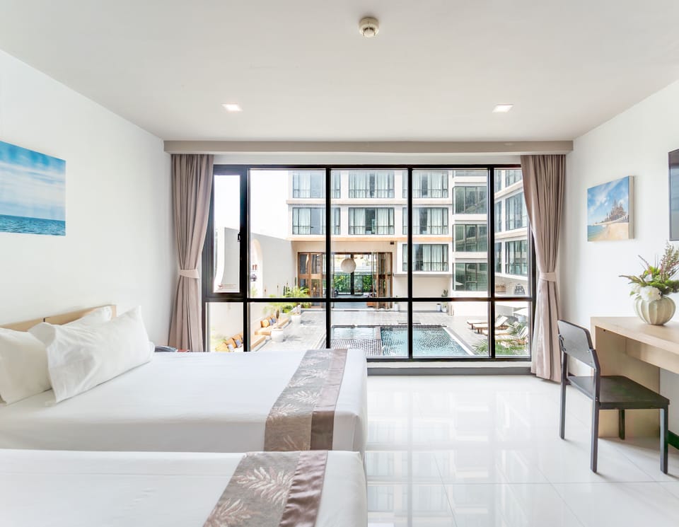 Superior Twin Room With Pool View | 2 bedrooms, in-room safe, desk, blackout drapes