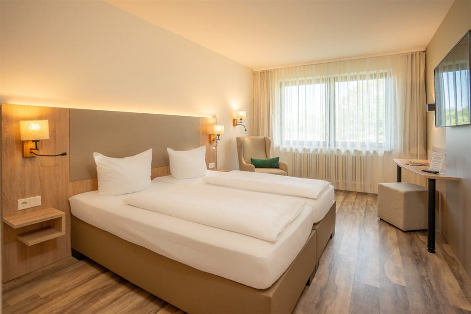 Hypo-allergenic bedding available, desk, laptop workspace