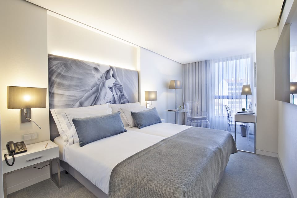Superior Double or Twin Room | Minibar, in-room safe, desk, blackout drapes