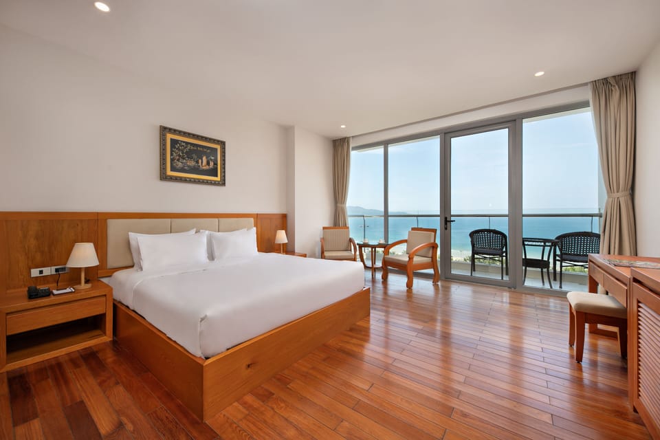 Suite, Seafront | Minibar, in-room safe, desk, blackout drapes