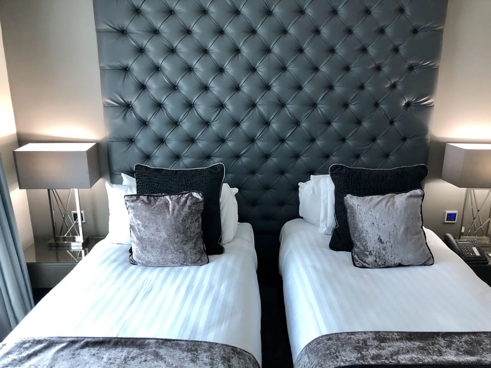 Superior Twin Room | In-room safe, desk, blackout drapes, iron/ironing board