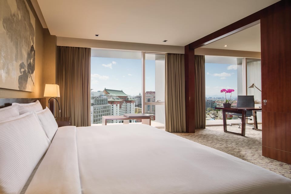 Premium bedding, minibar (some free items), in-room safe, desk