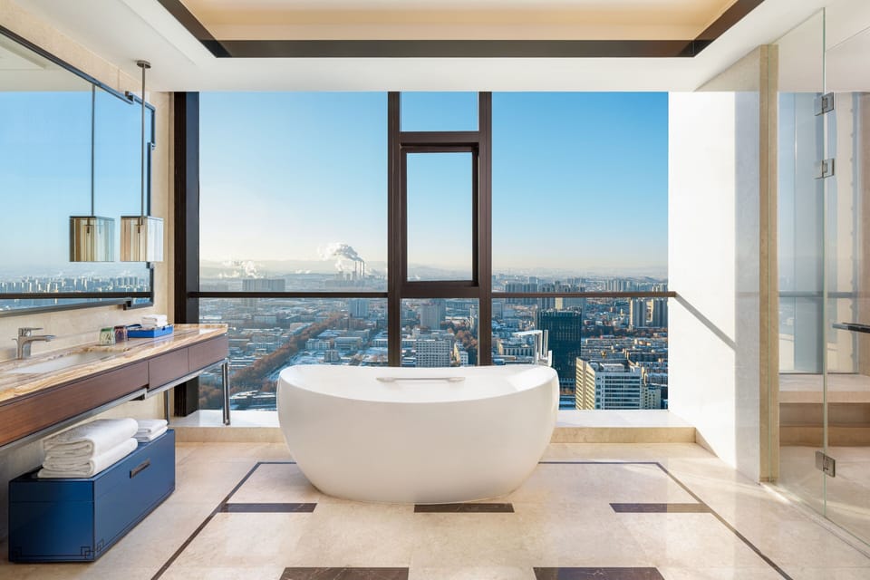 Rainfall showerhead, eco-friendly toiletries, hair dryer, slippers